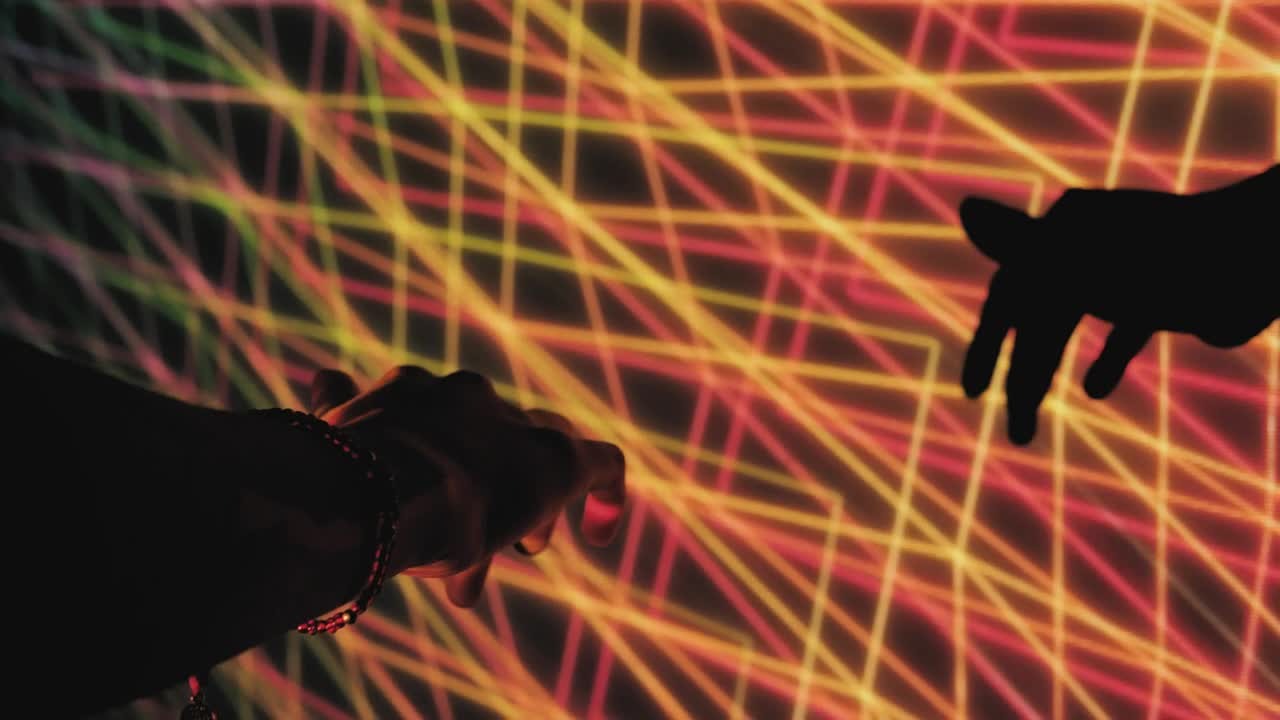 Video Stock Projection With Abstract Neon Lines And A Persons Hand Live Wallpaper Free