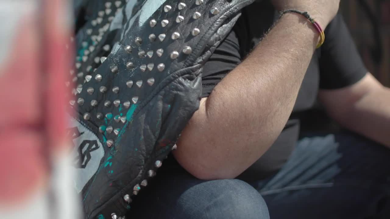 Video Stock Punk Man Holding A Black Leather Jacket Live Wallpaper Free