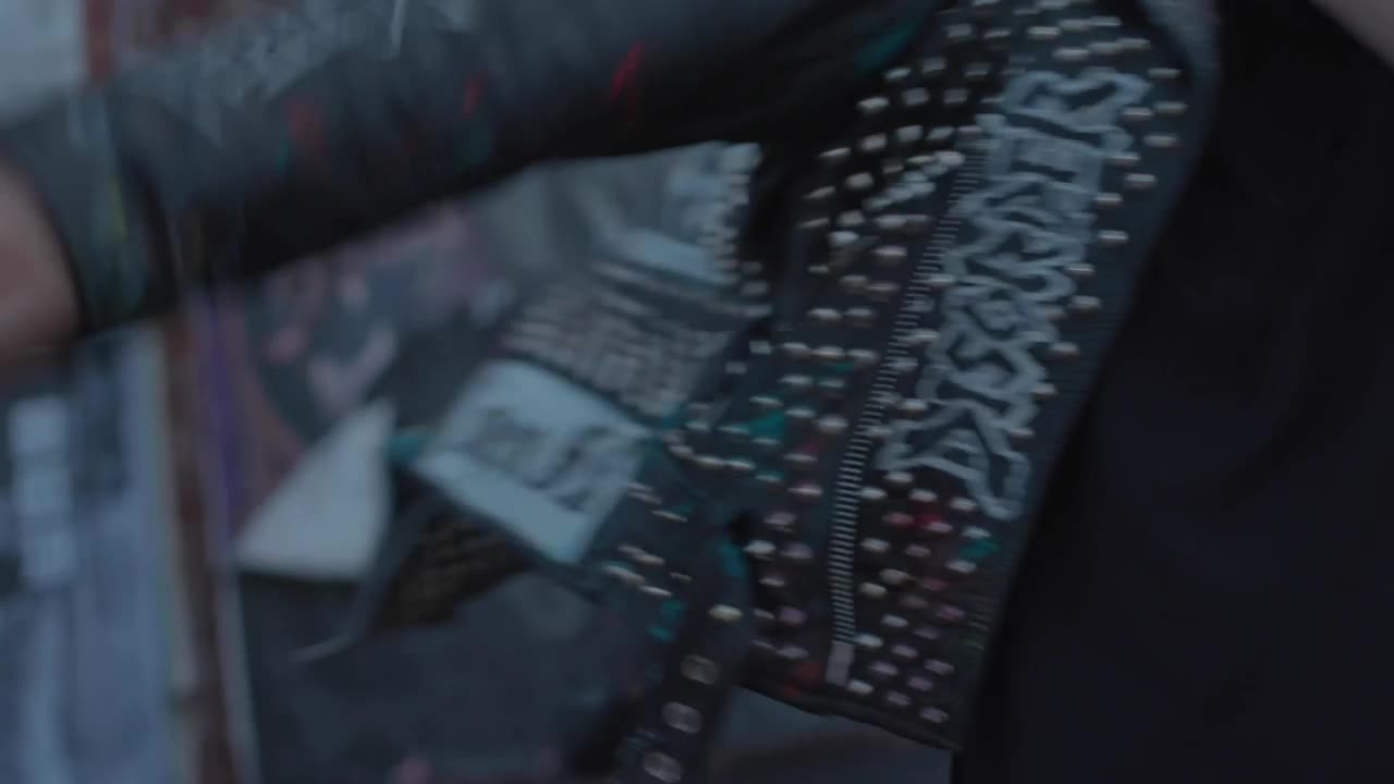 Video Stock Punk Man Puts On His Jacket Live Wallpaper Free