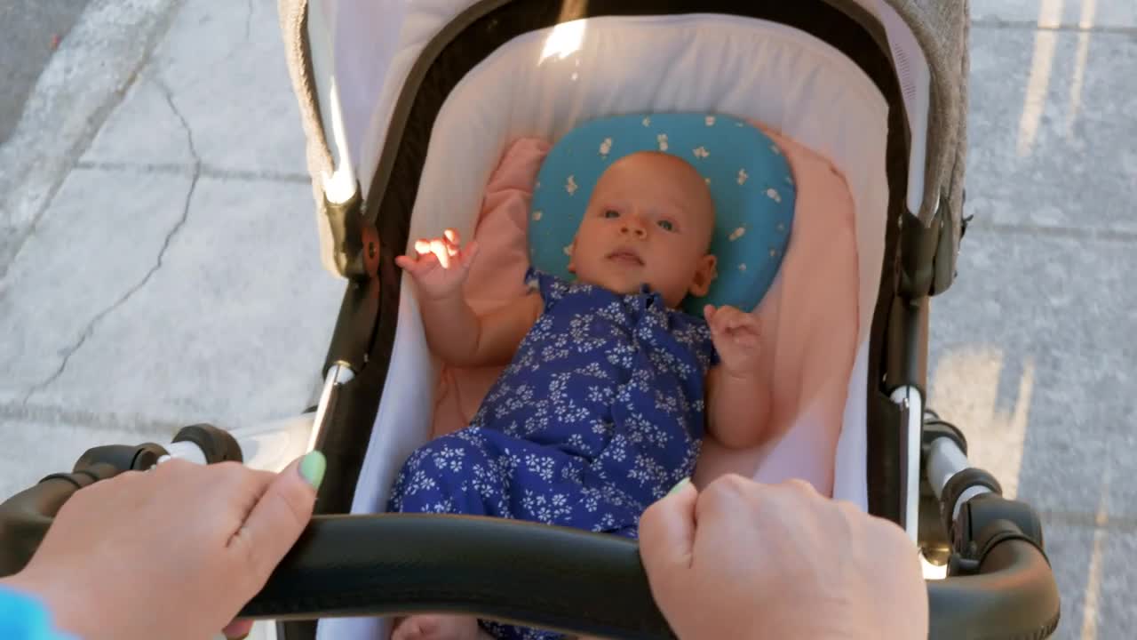 Video Stock Pushing A Young Baby In A Pram Live Wallpaper Free
