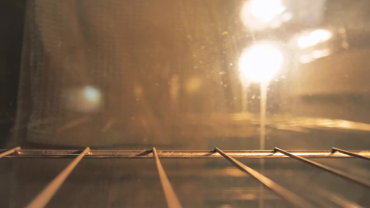 Video Stock Putting A Cake To Bake Seen From Inside The Oven Live Wallpaper Free