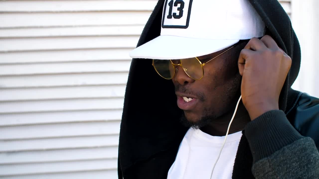 Video Stock Rapper Puts On Headphones To Listen To Music Live Wallpaper Free