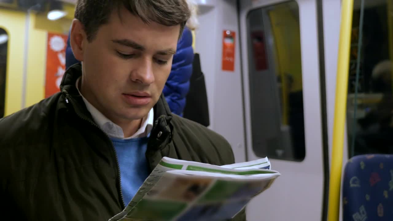 Video Stock Reading A Newspaper On The Train Live Wallpaper Free
