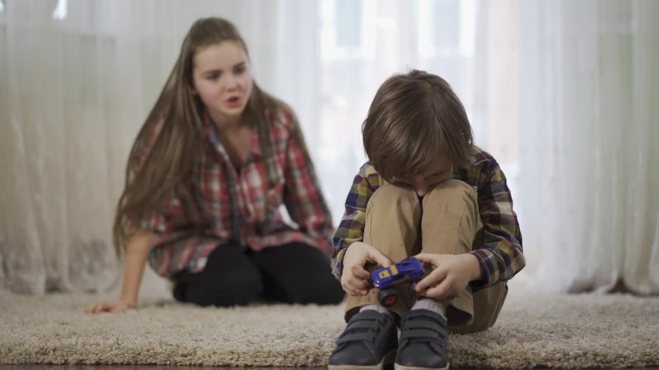 Free Stock Video Sister Quarrels With Little Brother Over Toy Live Wallpaper