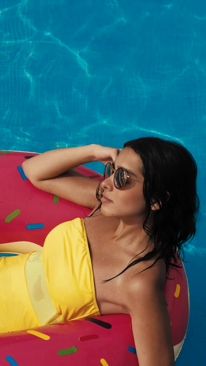 Free Stock Video Sitting In An Inflatable Donut In A Pool Live Wallpaper