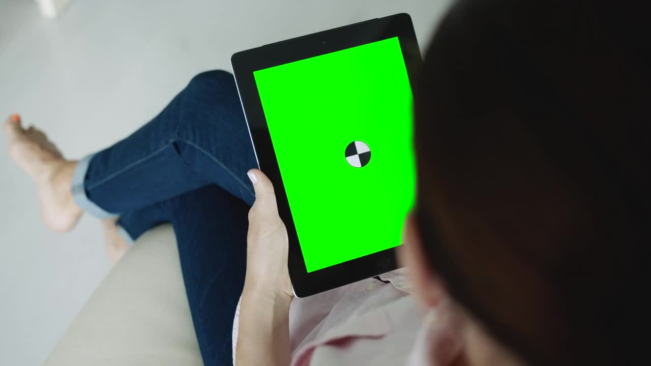 Free Stock Video Sitting Woman Holding Greenscreen Tablet With Chroma Key Live Wallpaper