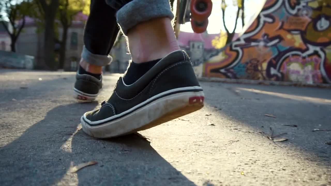 Free Stock Video Skateboarder Walking By In A Park Live Wallpaper