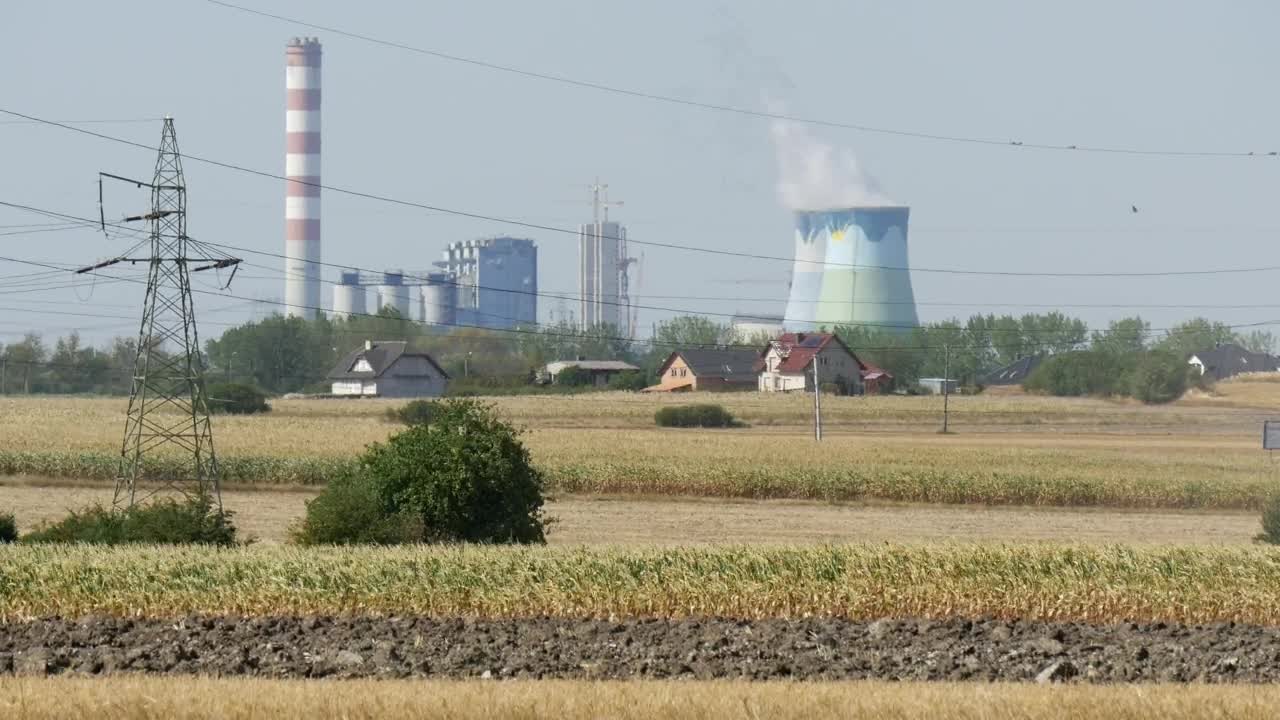 Free Stock Video Red Tractor Working On The Field With Industrial Background Live Wallpaper