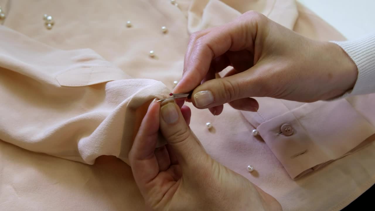 Free Stock Video Removing A Button Before Cleaning Live Wallpaper