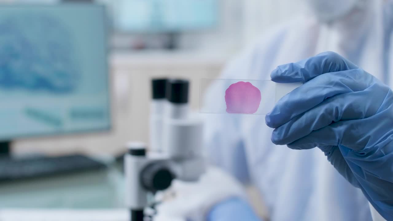 Free Stock Video Researcher Holding A Sample Live Wallpaper