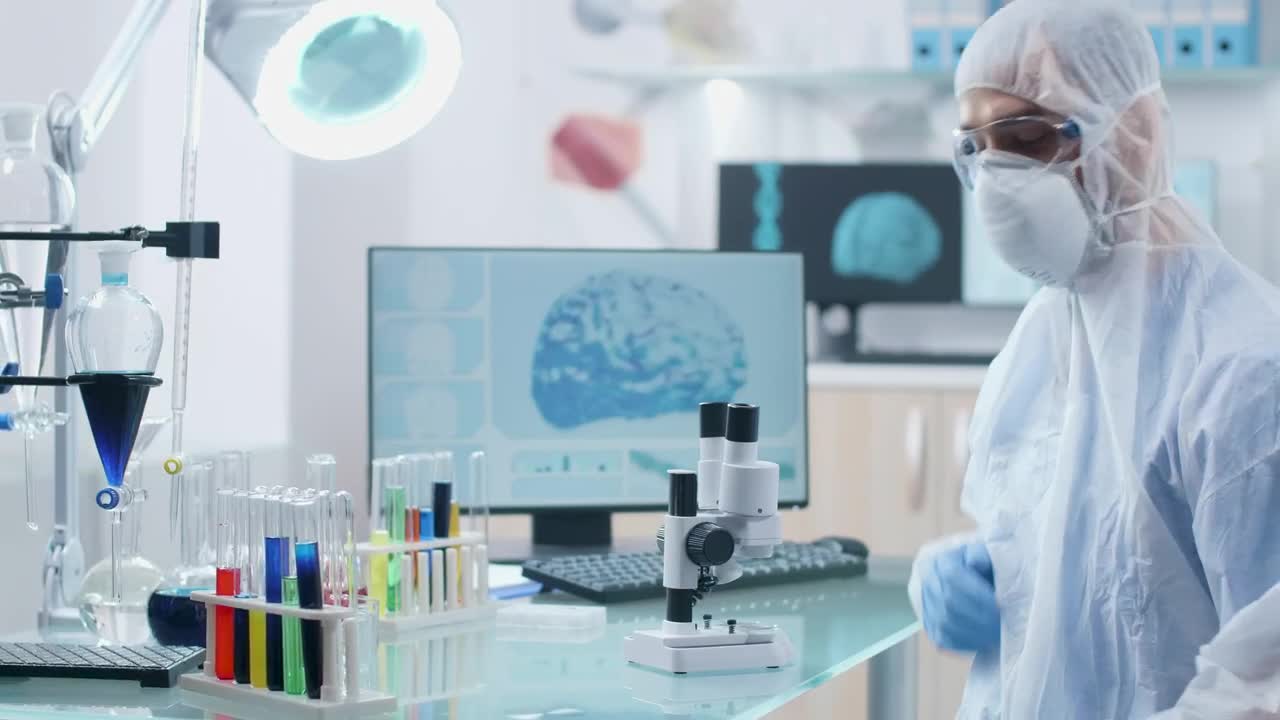 Free Stock Video Researcher Reviewing Samples Live Wallpaper