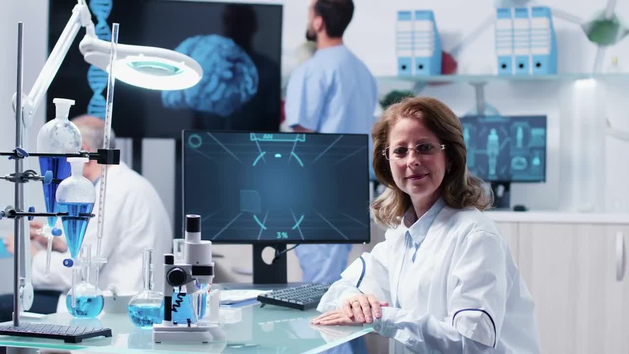 Free Stock Video Researcher Sitting At Her Desk Live Wallpaper