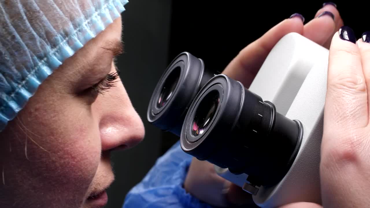 Free Stock Video Researcher Using Her Microscope Live Wallpaper
