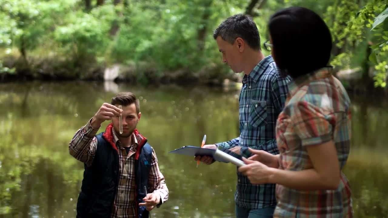 Free Stock Video Researchers Collecting Water Samples From The Lake Live Wallpaper