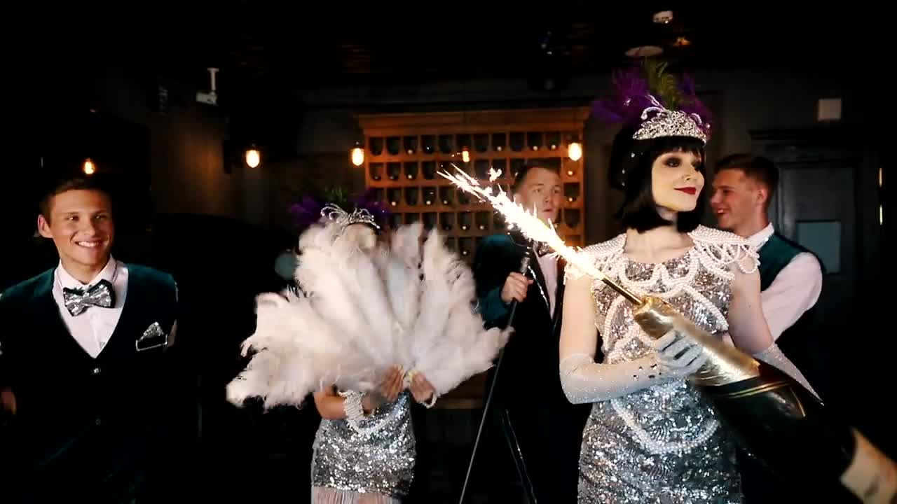 Free Stock Video Retro Theme Party With A Woman Holding A Big Champagne Live Wallpaper