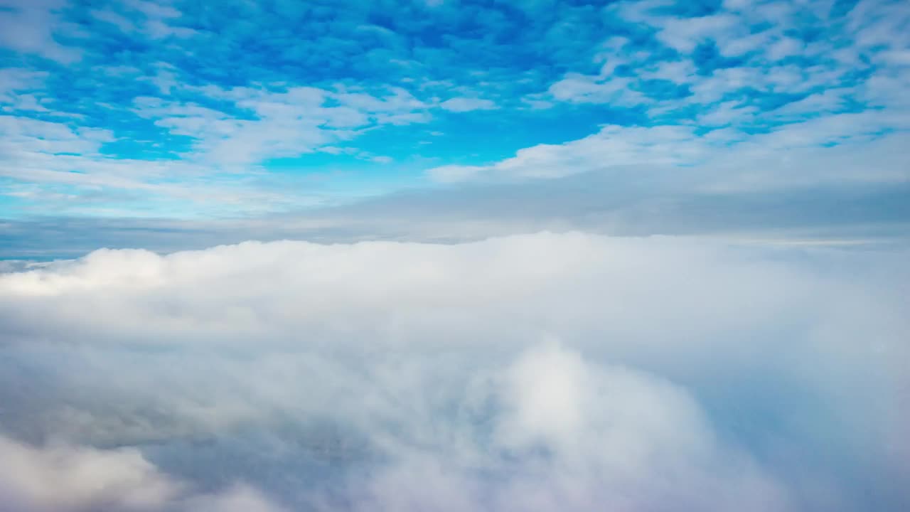 Free Stock Video Revealing A Snowy Mountain From The Cloudy Sky Live Wallpaper