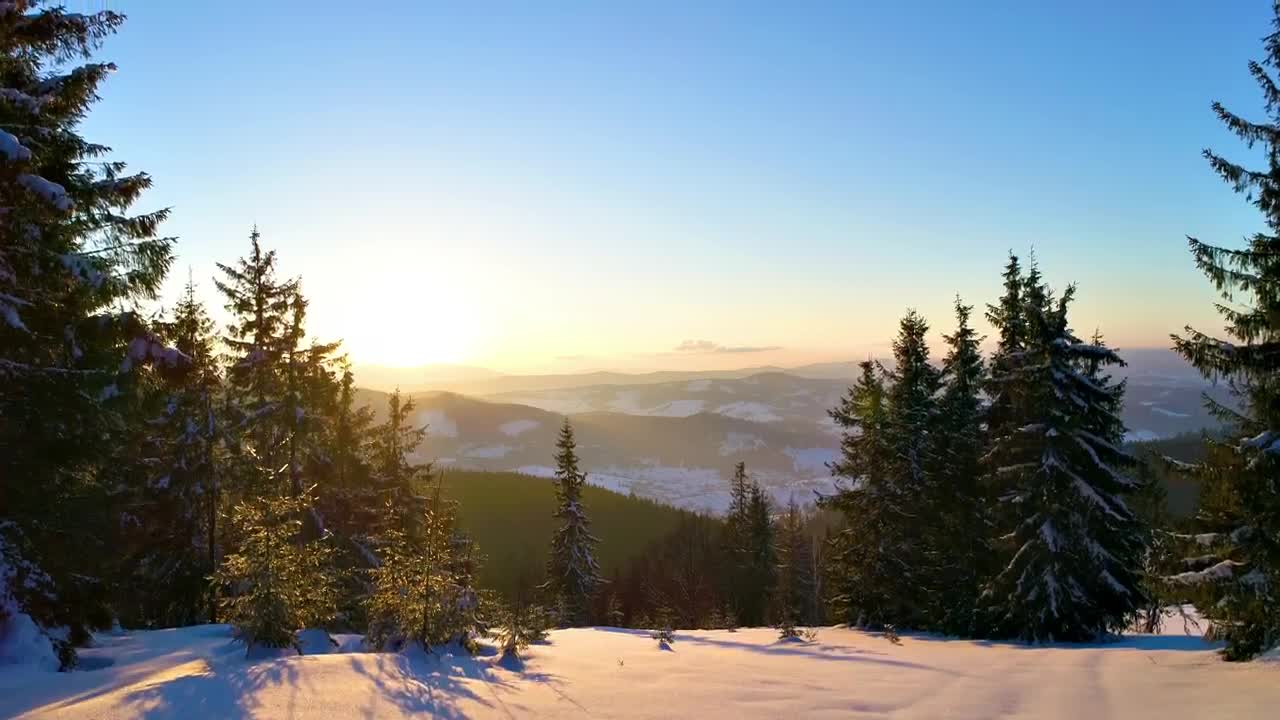 Free Stock Video Revealing A Snowy Mountain Range At Sunset Live Wallpaper