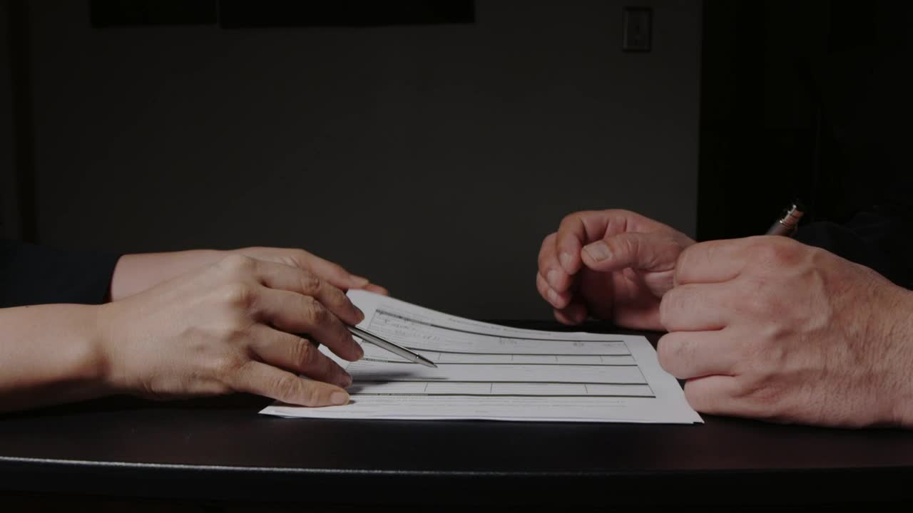 Free Stock Video Reviewing A Job Application Live Wallpaper