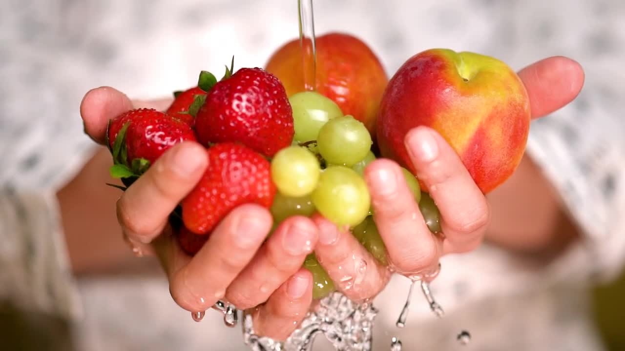 Free Stock Video Rinsing Strawberries Apples And Grapes Holding Hands Live Wallpaper