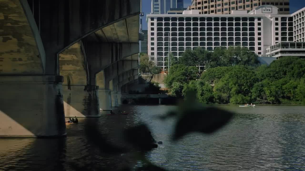 Free Stock Video River In The City With Motorboats Passing Under A Bridge Live Wallpaper