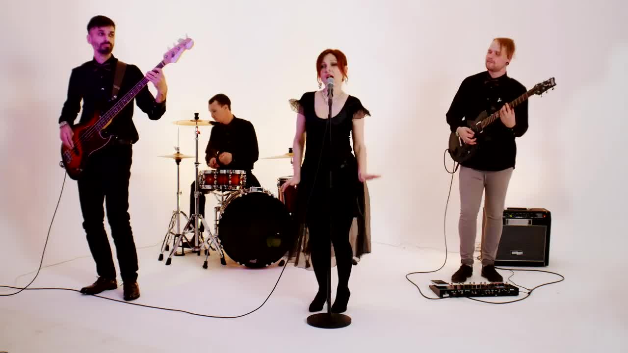 Free Stock Video Rock Band Playing A Song In A Bright Studio Live Wallpaper