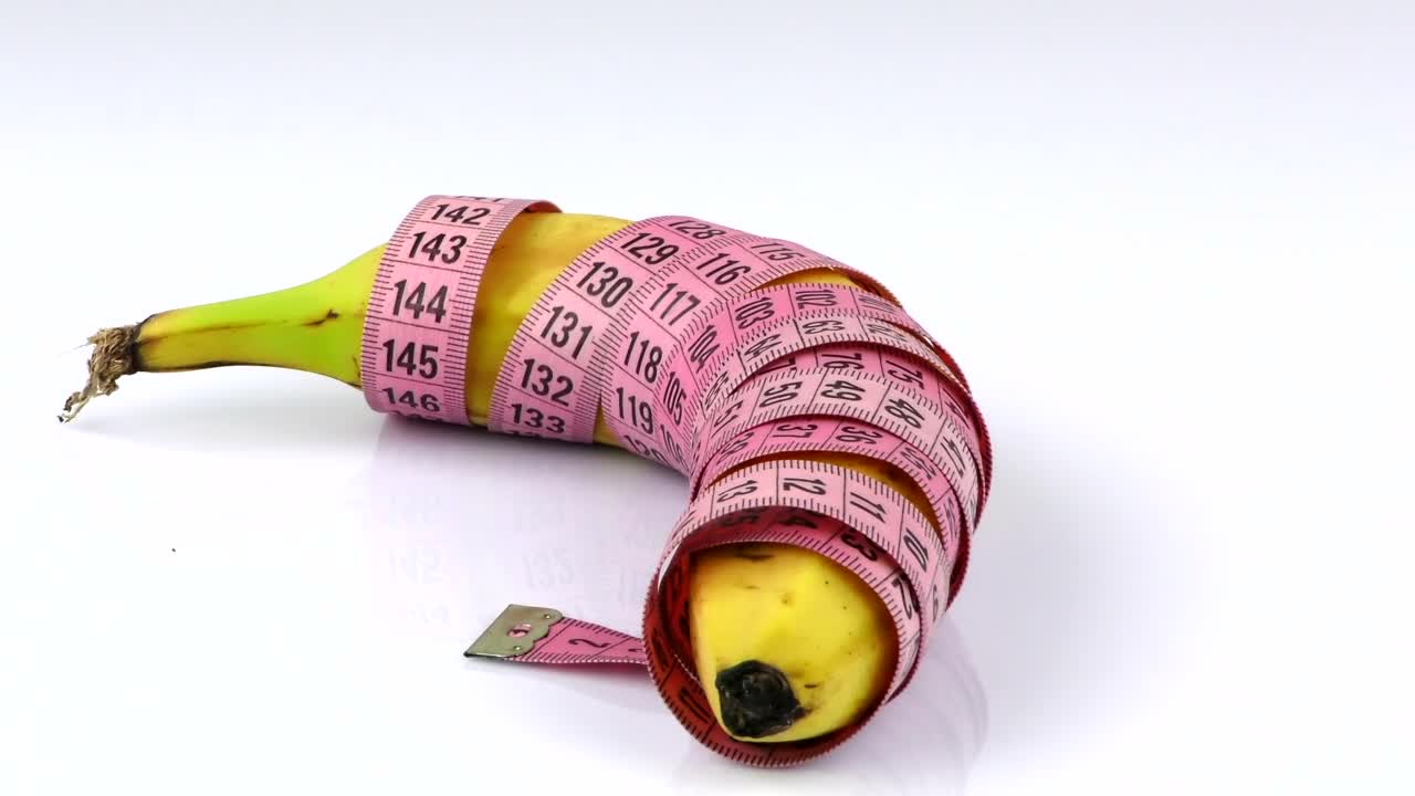 Free Stock Video Rolled Banana With Measuring Tape Live Wallpaper