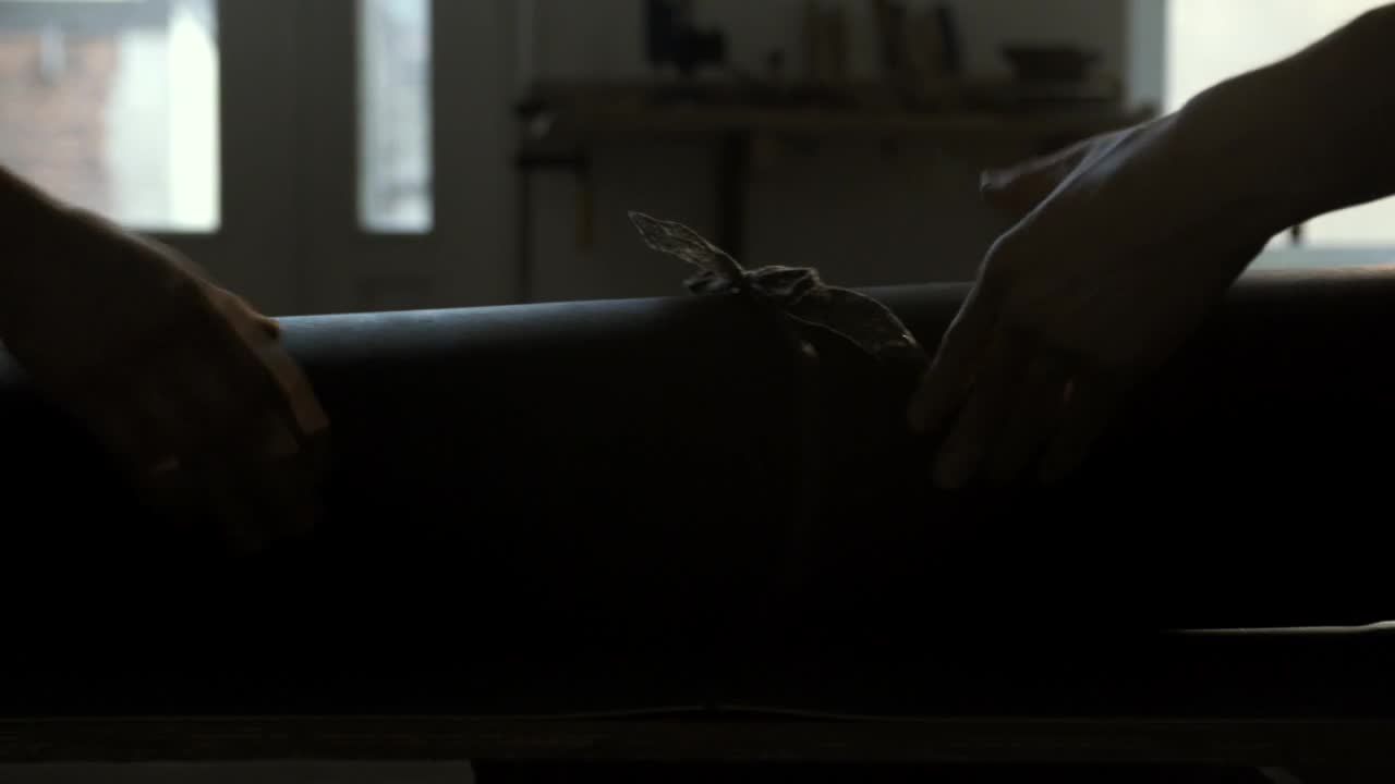 Free Stock Video Rolling Out A Leather Material Live Wallpaper