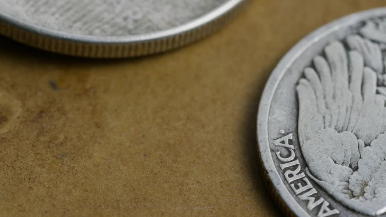 Free Stock Video Rotating Close Up Footage Of Coins On The Table Live Wallpaper