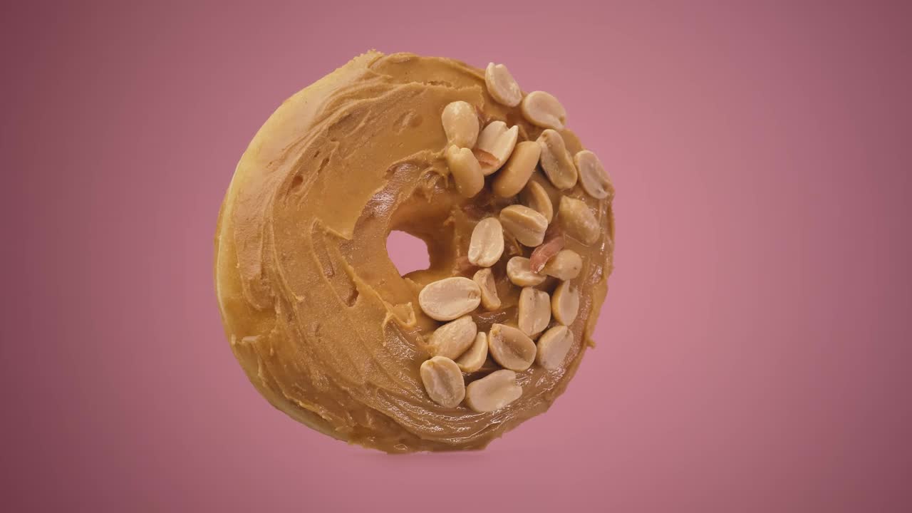 Free Stock Video Rotating Peanut Butter Donut On A Pink Background Live Wallpaper