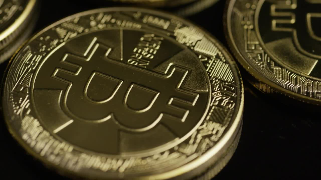 Free Stock Video Rotating Shot Of Bitcoins On A Black Surface Live Wallpaper