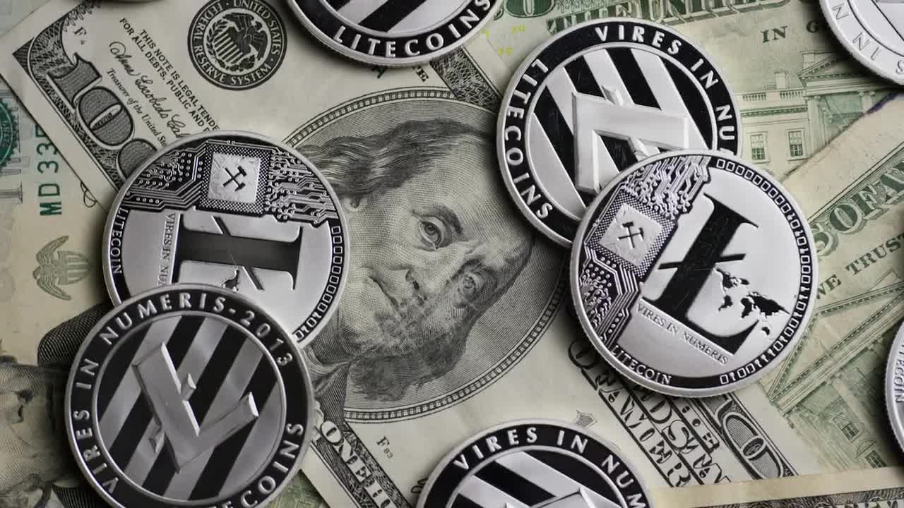 Free Stock Video Rotating Shot Of Cryptocurrency Coins Over Dollar Bills Live Wallpaper