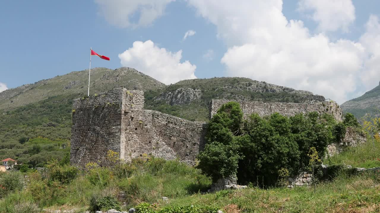 Free Stock Video Ruins Of An Old Building With A Red Flag Live Wallpaper