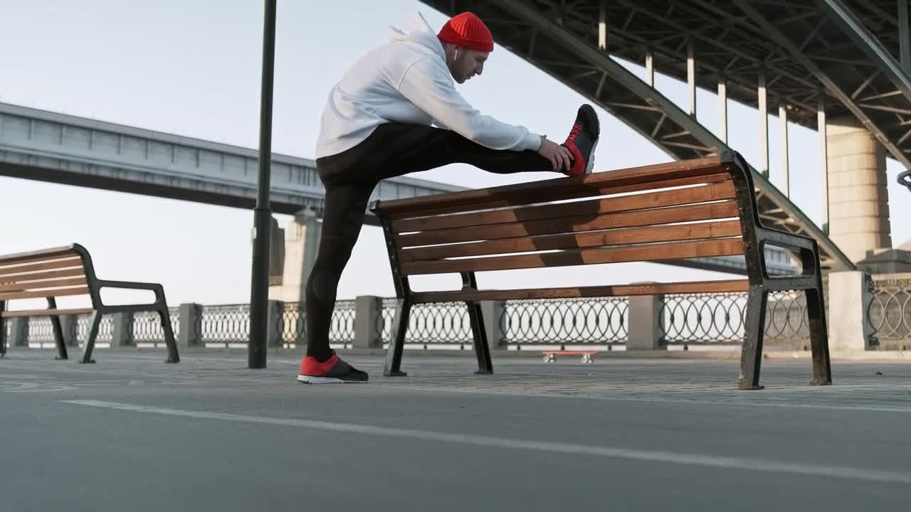 Free Stock Video Runner Stretching His Body Before Start Running Live Wallpaper