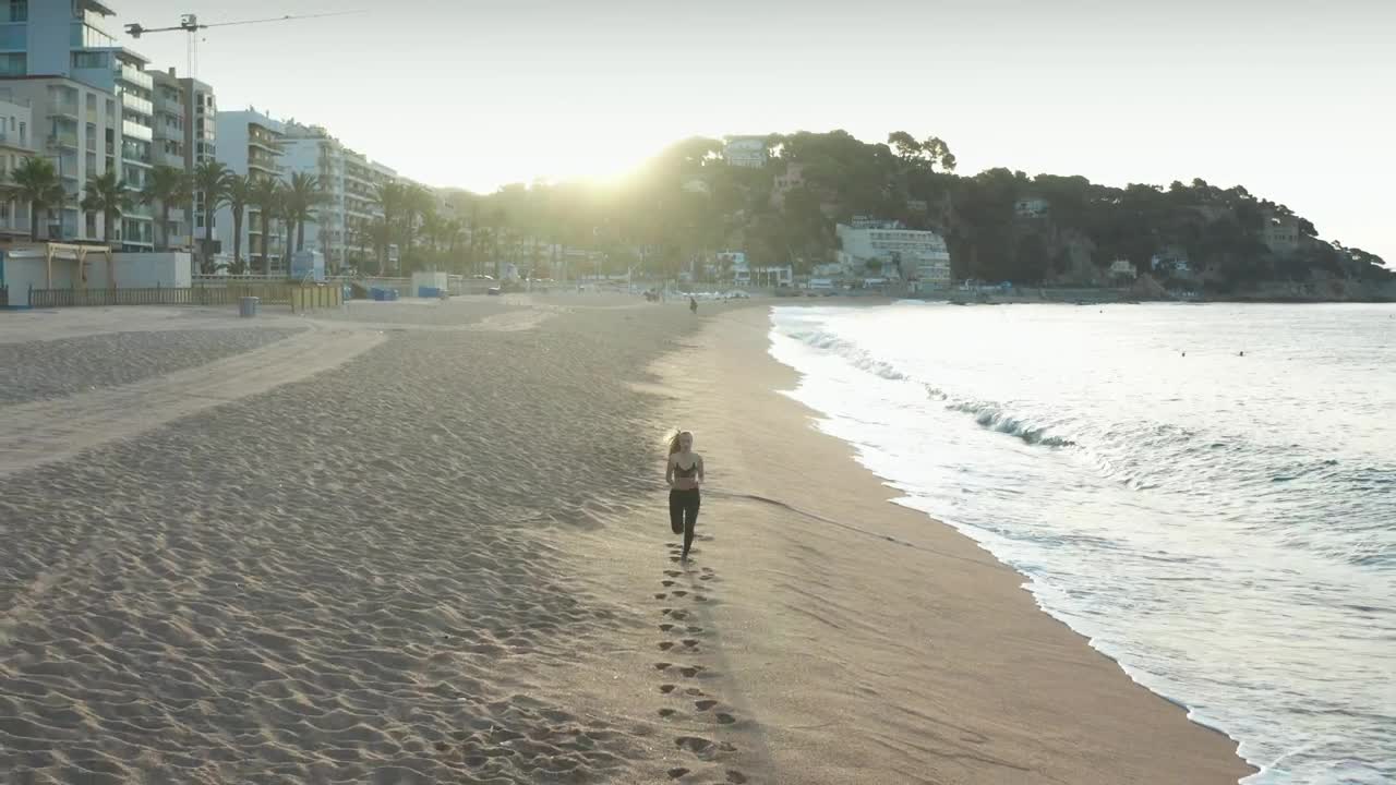 Free Stock Video Running Along A Town Beach Live Wallpaper