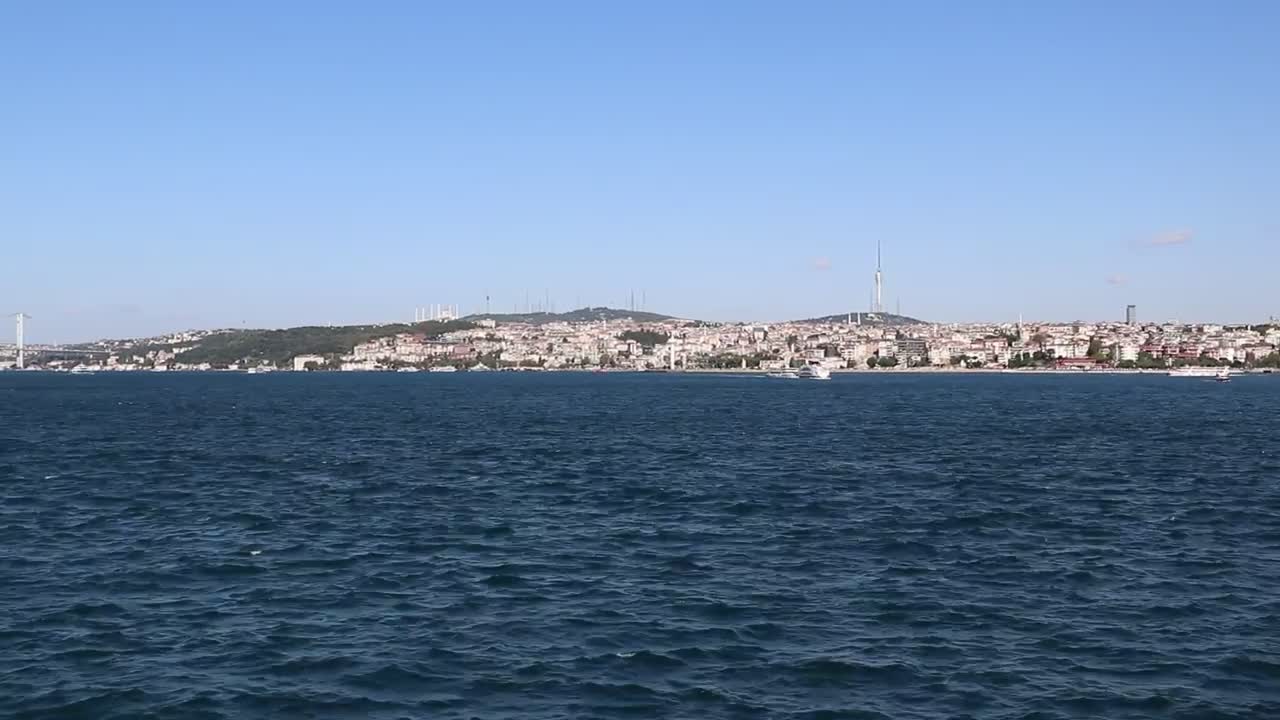 Free Stock Video Sailing The Sea Near The Shore Of A City Live Wallpaper