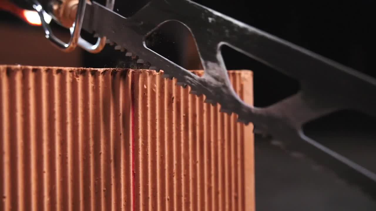Free Stock Video Sawing Through A Brick Live Wallpaper