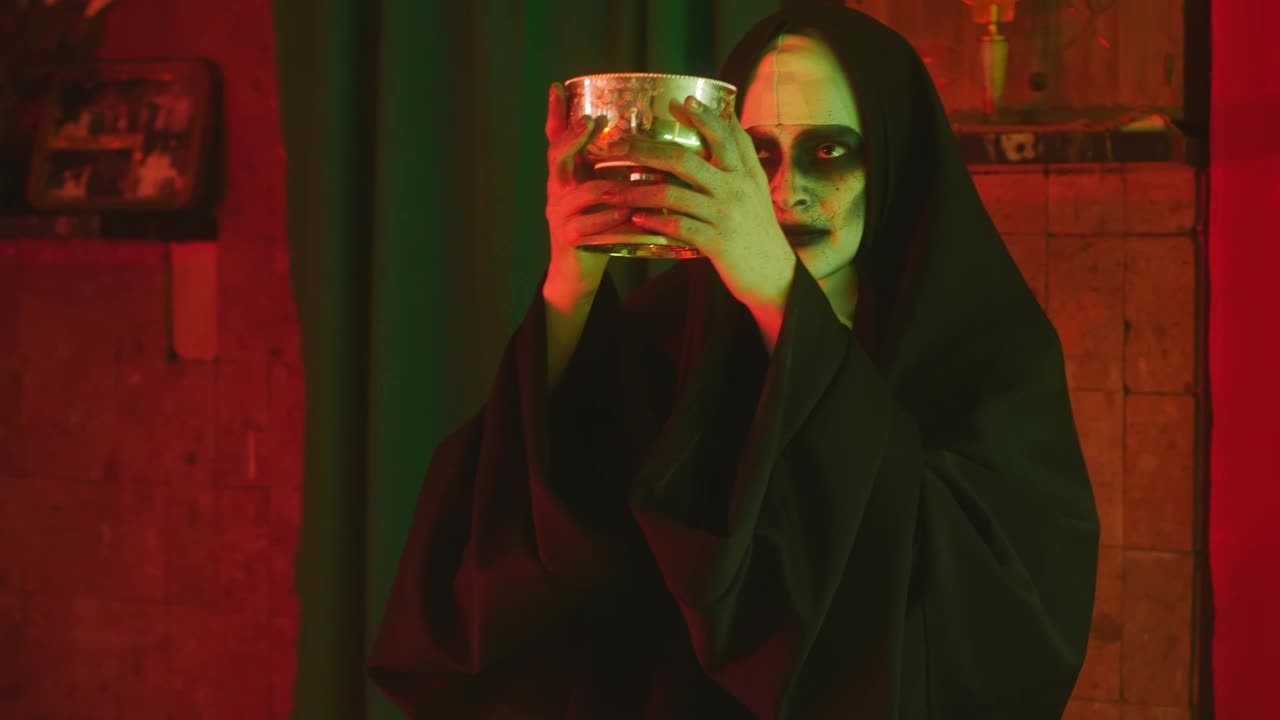 Free Stock Video Scary Ghost Nun Lifting A Chalice In A Church Live Wallpaper