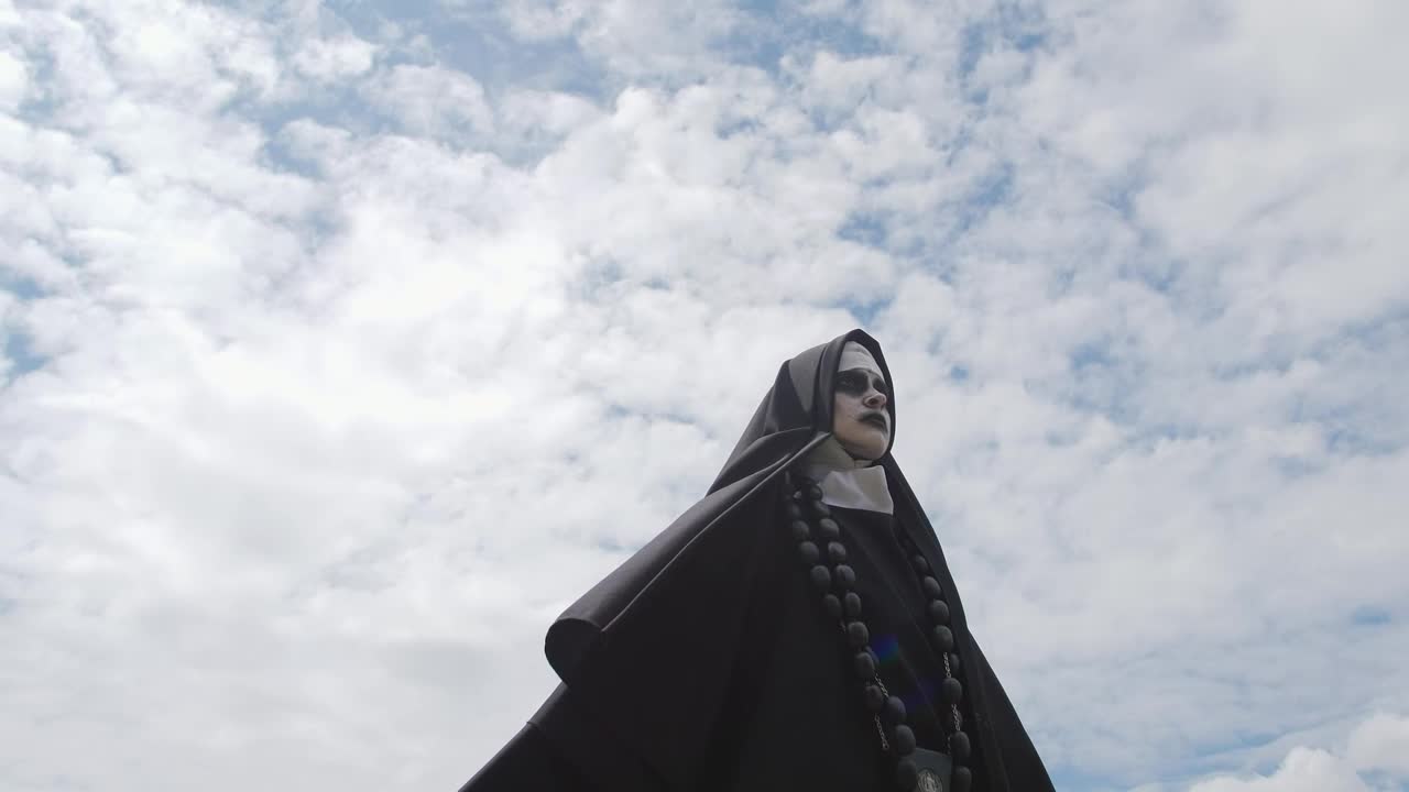 Free Stock Video Scary Ghost Nun Outside On A Sunny Day Live Wallpaper