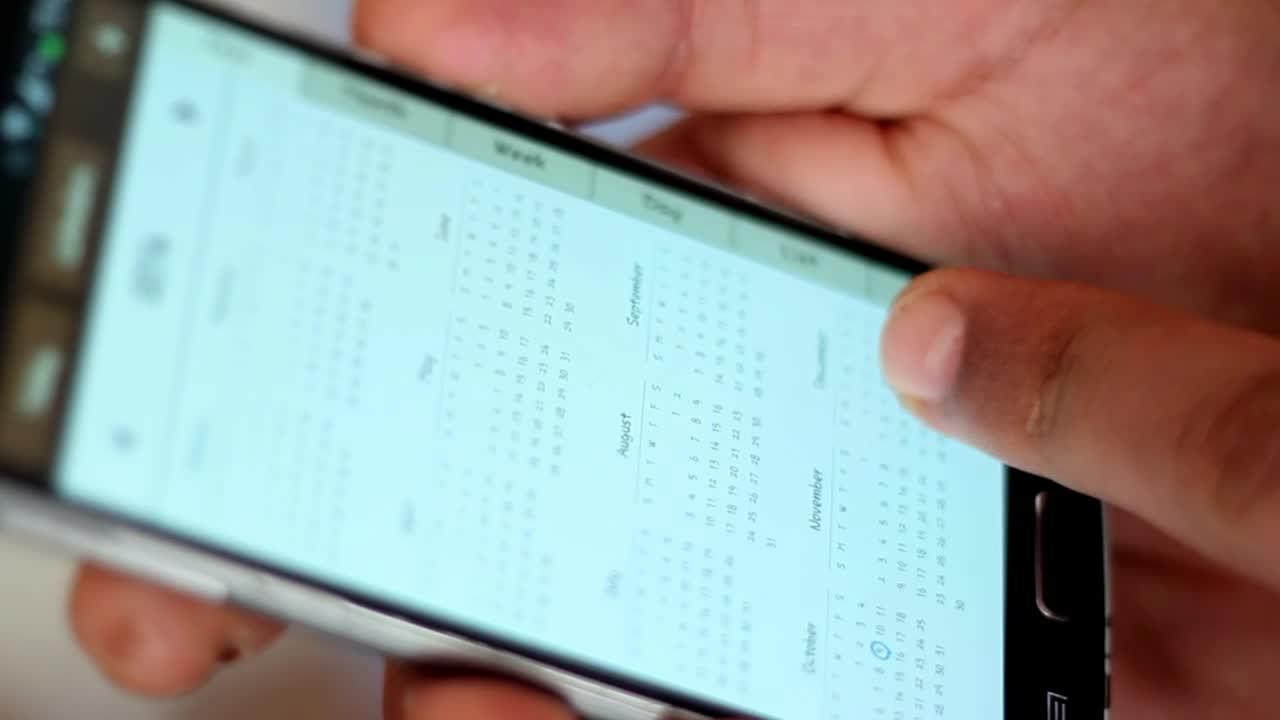 Free Stock Video Scheduling An Appointment On A Smartphone Live Wallpaper