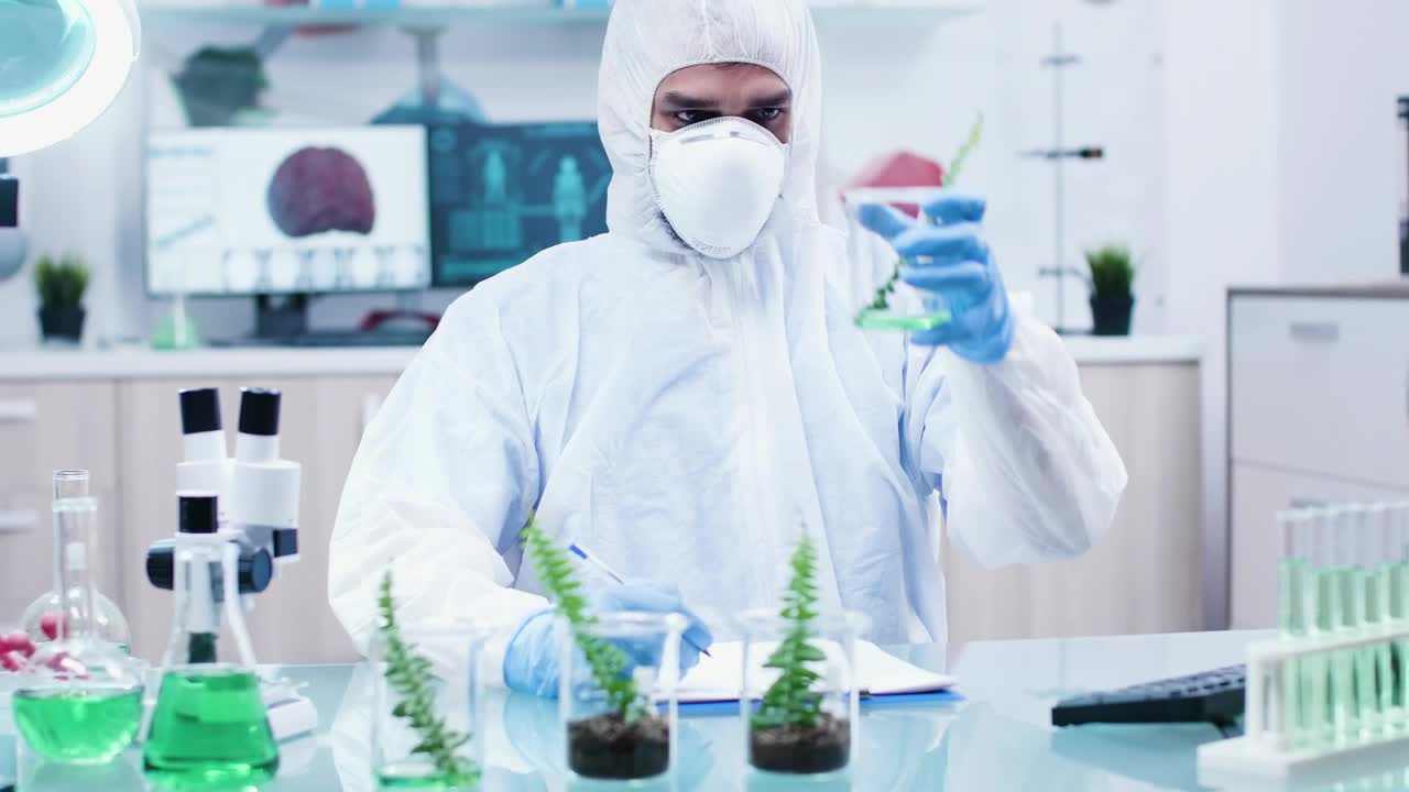 Free Stock Video Scientist Doing Research In Biology Lab With Face Mask Live Wallpaper