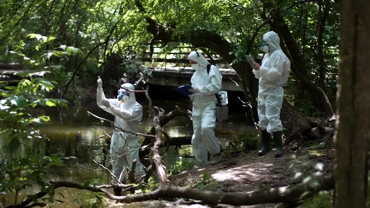 Free Stock Video Scientist In Biohazard Suits Collecting Samples Live Wallpaper