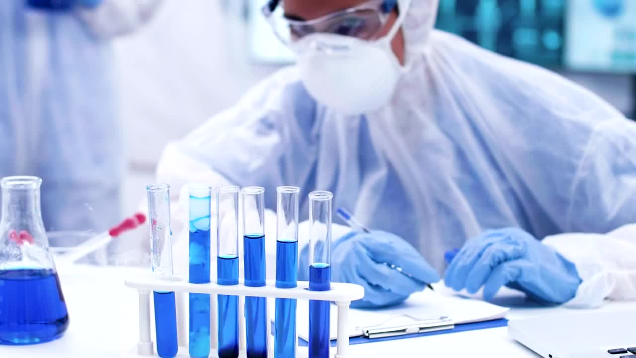 Free Stock Video Scientist With Bubbling Vials Live Wallpaper