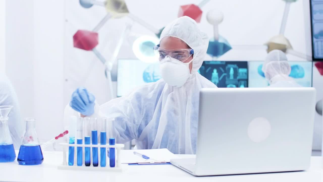 Free Stock Video Scientist Working With Vials Live Wallpaper