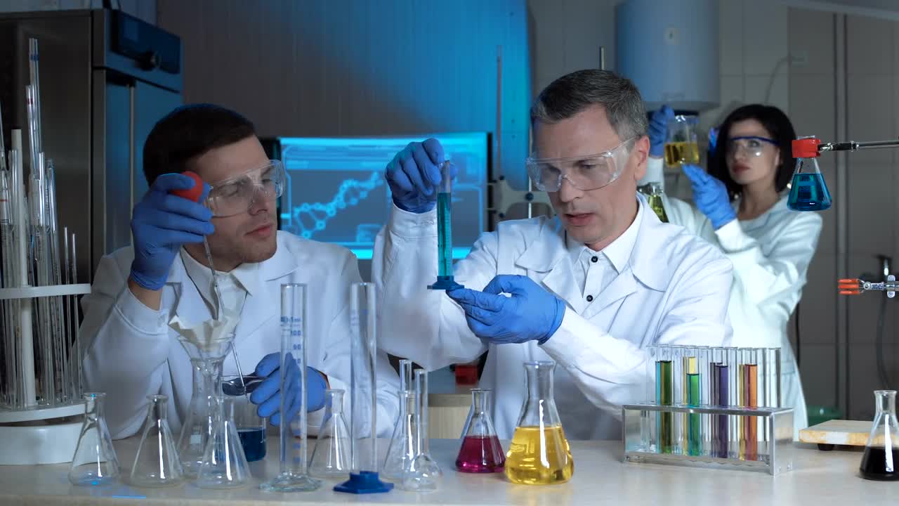 Free Stock Video Scientists Compare Chemical Samples Live Wallpaper