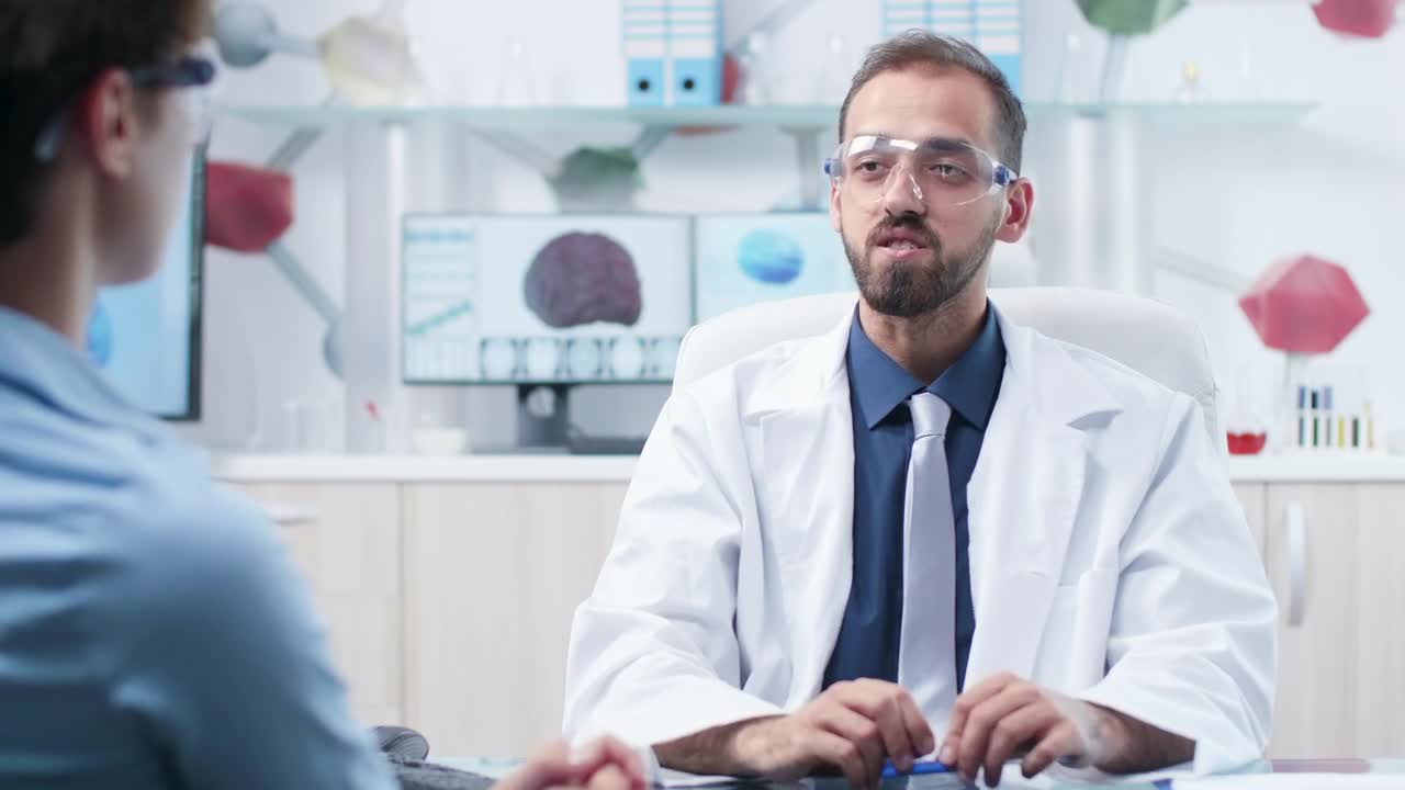 Free Stock Video Scientists Share Innovation Using Ar Tech In Modern Research Lab Live Wallpaper