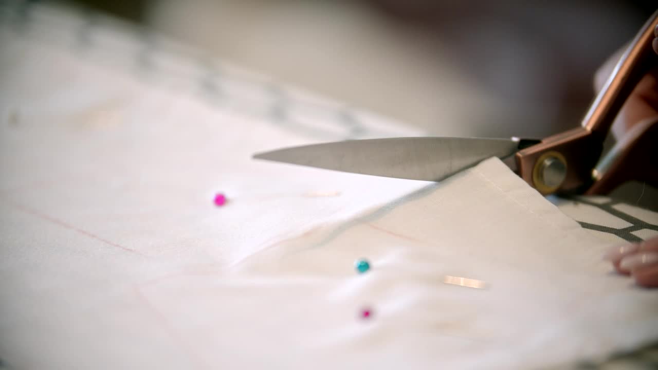 Free Stock Video Seamstress Cutting White Fabric Live Wallpaper