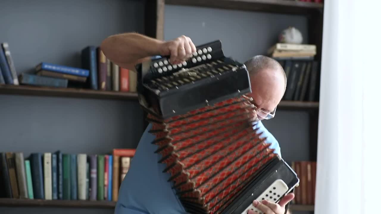Free Stock Video Senior Man Playing The Accordion Live Wallpaper