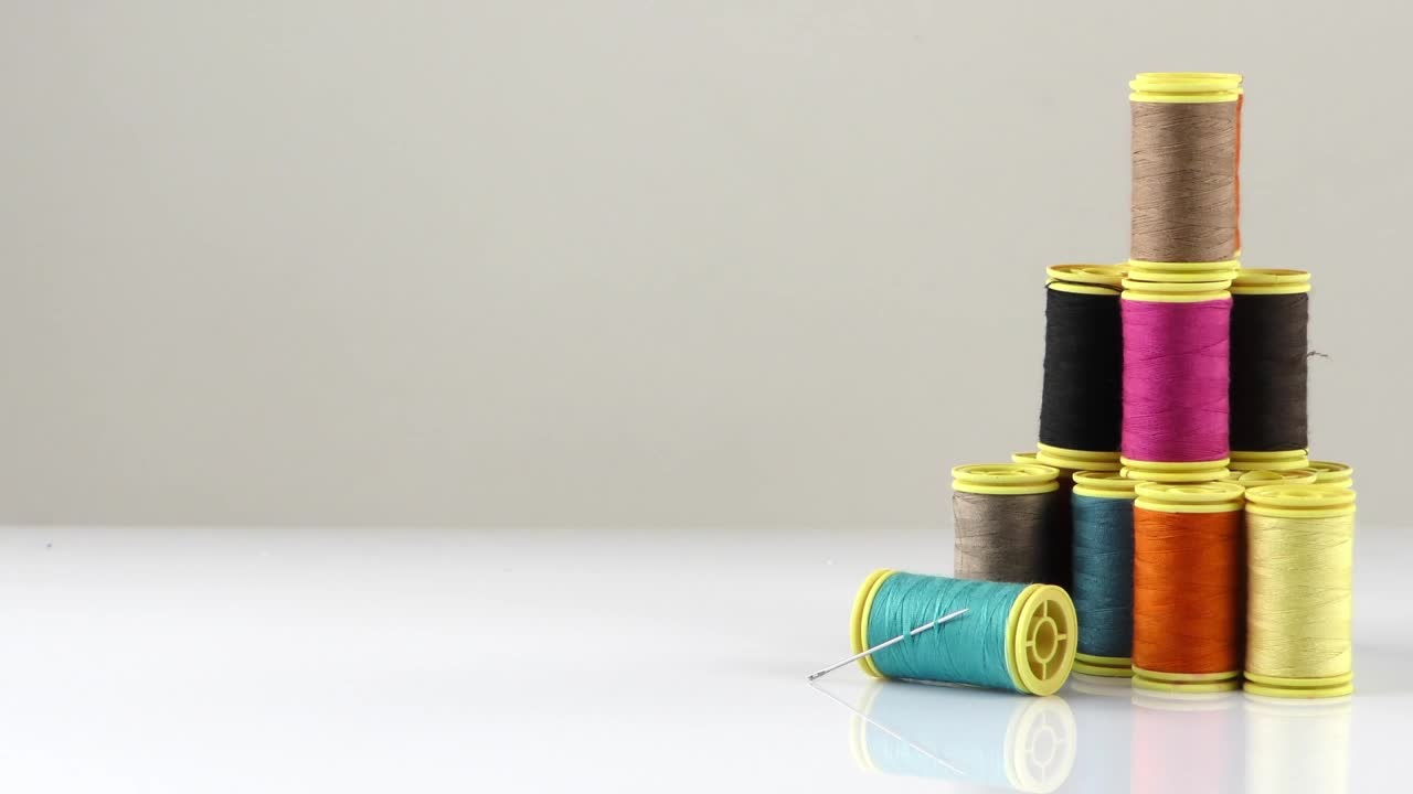 Free Stock Video Sewing Threads On White Background Live Wallpaper