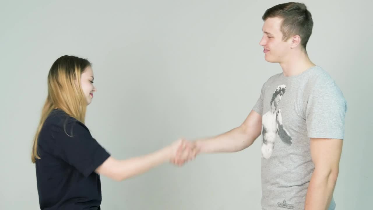 Free Stock Video Shaking Hands Against An Isolated Background Live Wallpaper