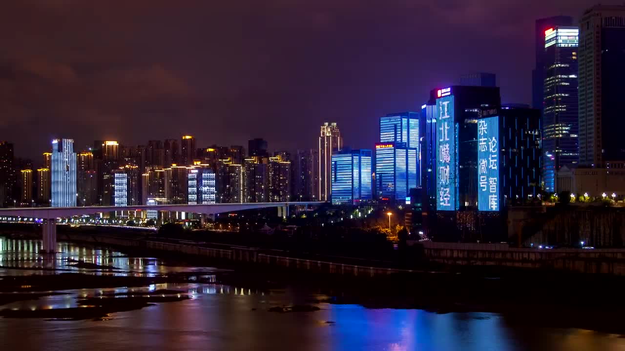 Free Stock Video Shining Buildings In A City With A River At Night Live Wallpaper